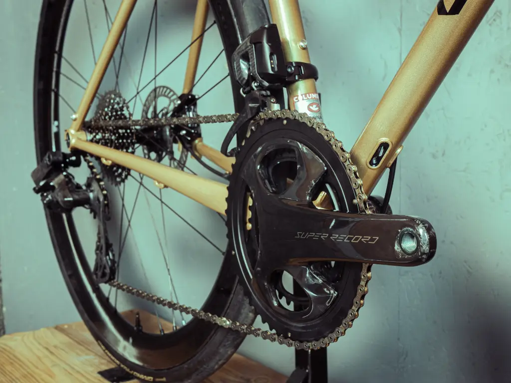 glacier_macaron_satin_poly_gold_zoom_crankset_super_record_steel_gravel_WS.webp